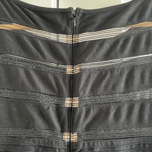 Long, chic black Tadashi Shoji gown with mesh-like panels and ribbed midsection - Picture 7 of 12